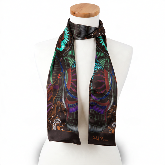 Trebor Style Ziio black silk satin tube scarf featuring a vibrant jungle print in blue, green, purple, and burgundy.