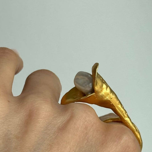 Trebor Style calla lily ring in 24k brushed gold filled metal featuring a lustrous biwa pearl on an adjustable band.