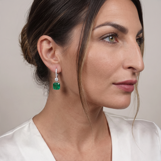 Trebor Style 10ctw Asscher-cut emerald green and white cubic zirconia drop earrings in rhodium-plated sterling silver.