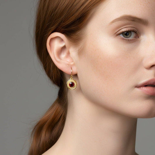 Trebor Style garnet earrings featuring 6mm crimson stones in 14K gold-filled double halo frames on a model