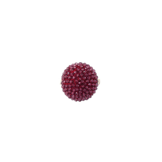 Trebor Style cocktail ring featuring a sphere of faceted purple garnet beads set on an 18k yellow gold band.