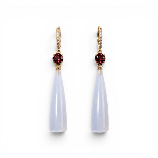 Trebor Style teardrop earrings featuring translucent blue chalcedony, deep red garnet accents, and gold-tone pavé crystals.