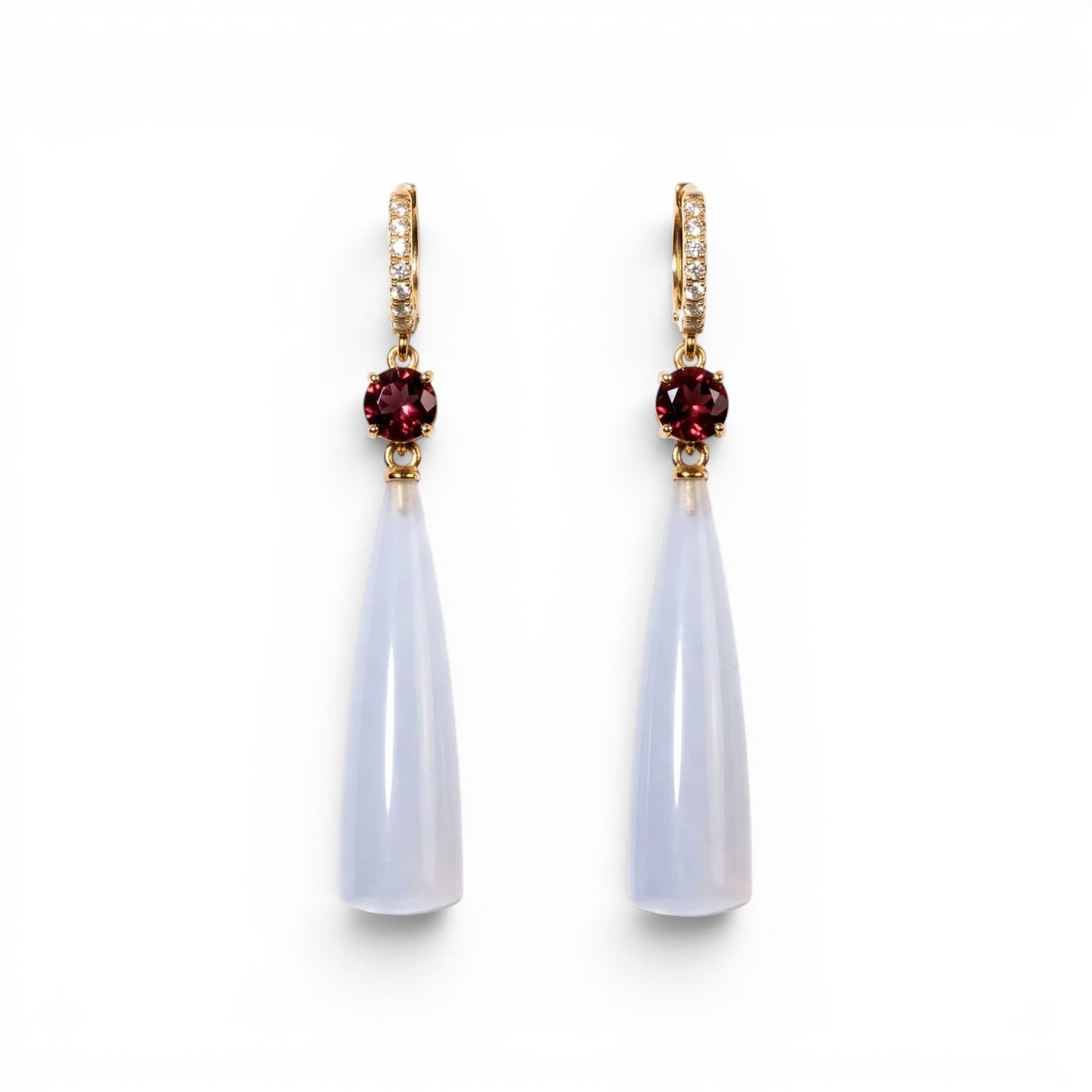 Trebor Style teardrop earrings featuring translucent blue chalcedony, deep red garnet accents, and gold-tone pavé crystals.
