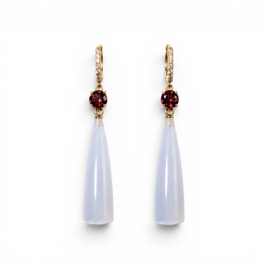 Trebor Style teardrop earrings featuring translucent blue chalcedony, deep red garnet accents, and gold-tone pavé crystals.