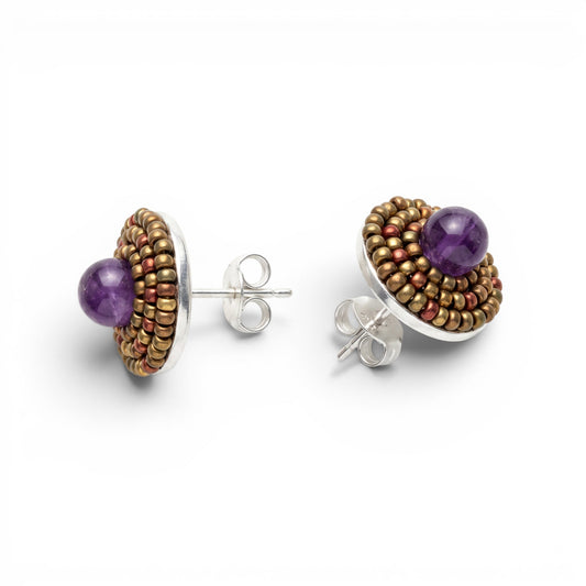 Trebor Style Ziio button earrings featuring purple amethyst gemstones surrounded by golden Murano glass beads.