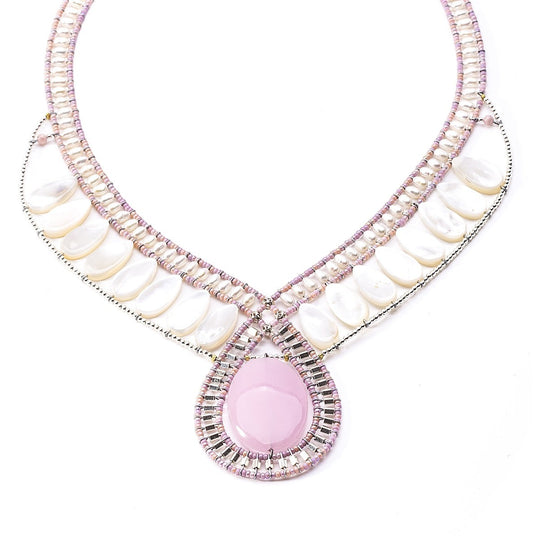 Trebor Style Ziio statement necklace with pink rhodochrosite cabochon, white mother of pearl, and Murano glass beads.