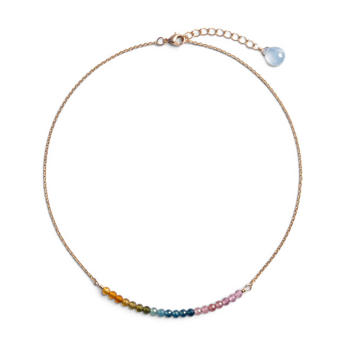 Trebor Style sterling silver necklace featuring a delicate chain and a curved bar of multi-colored tourmaline beads.
