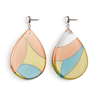 Trebor Style handmade teardrop earrings featuring pastel orange, yellow, and blue silk encased in clear acrylic.