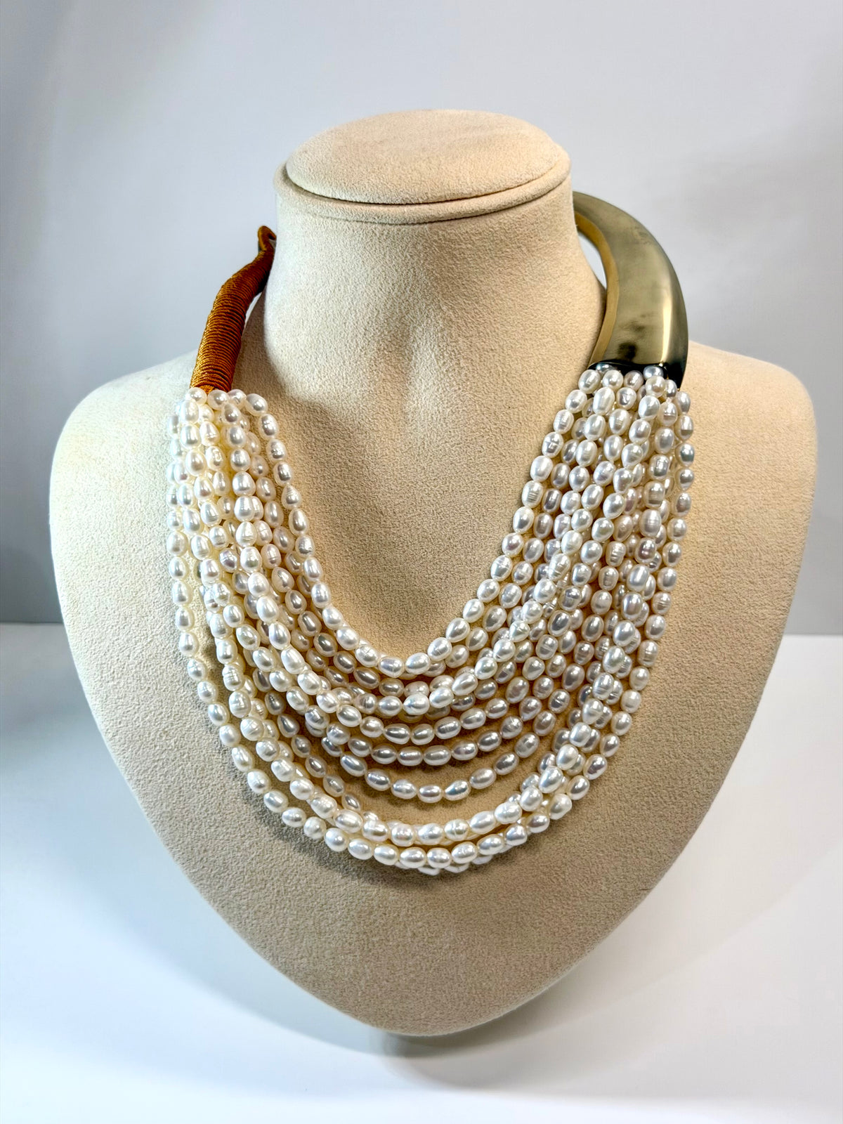 Multi-strand White Pearl Necklace with Asymmetrical Neck Band