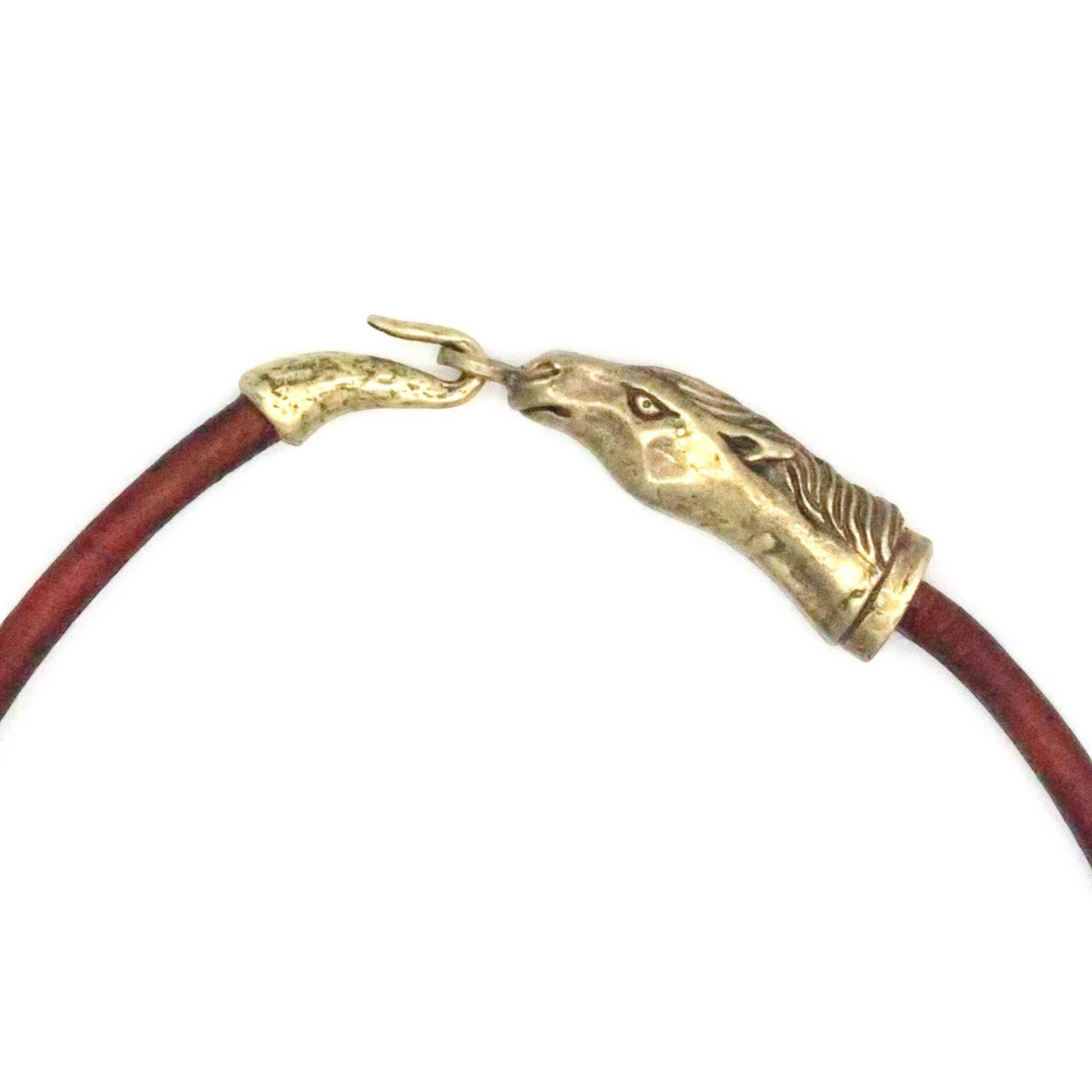 Trebor Style Wild Spirit horse choker featuring a sculpted gold patina horse head clasp on a brown leather cord.