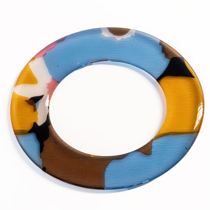 Trebor Style flat acrylic bangle featuring hand-painted sky blue, gold, and floral motifs in an organic round shape.