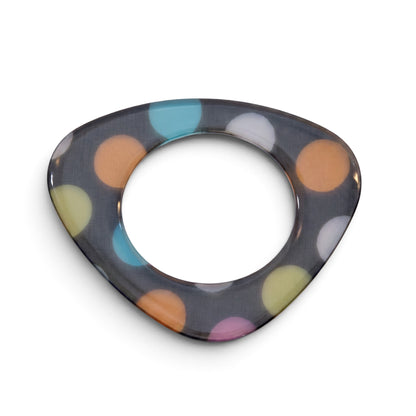 Trebor Style flat acrylic bangle featuring a triangular shape and a hand-painted multicolor polka dot pattern.