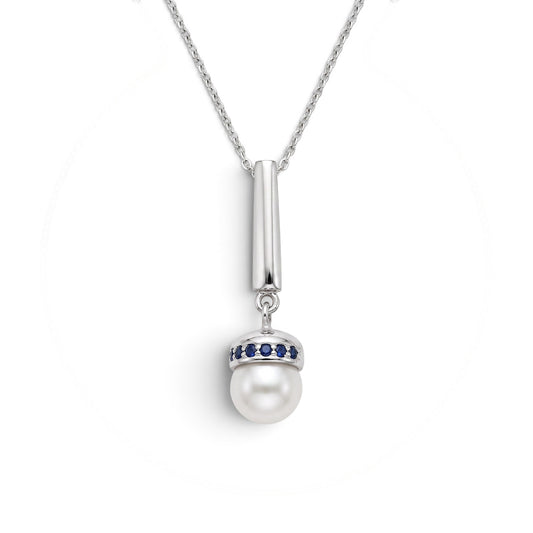 Trebor Style Akoya pearl pendant necklace with blue sapphire accents on a brushed rhodium plated sterling silver chain