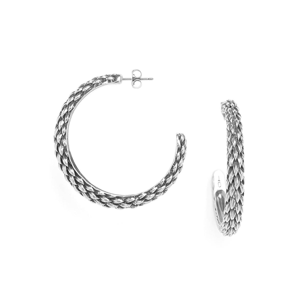 Trebor Style Araucaria botanical drop earrings in oxidized silver with a textured, pine-inspired sculptural design.