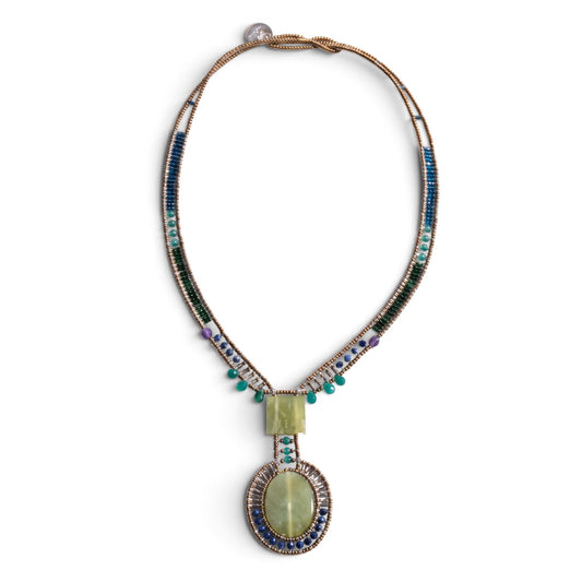 Trebor Style Arkanis long necklace featuring a large green vesuvianite pendant, jade, lapis, and murano glass beads.
