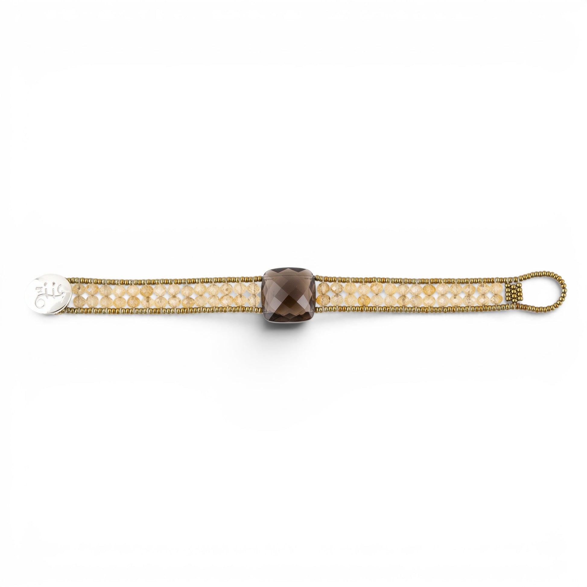 Trebor Style Ziio Armonia tennis bracelet with a central smokey quartz, yellow citrine beads, and gold Murano glass.