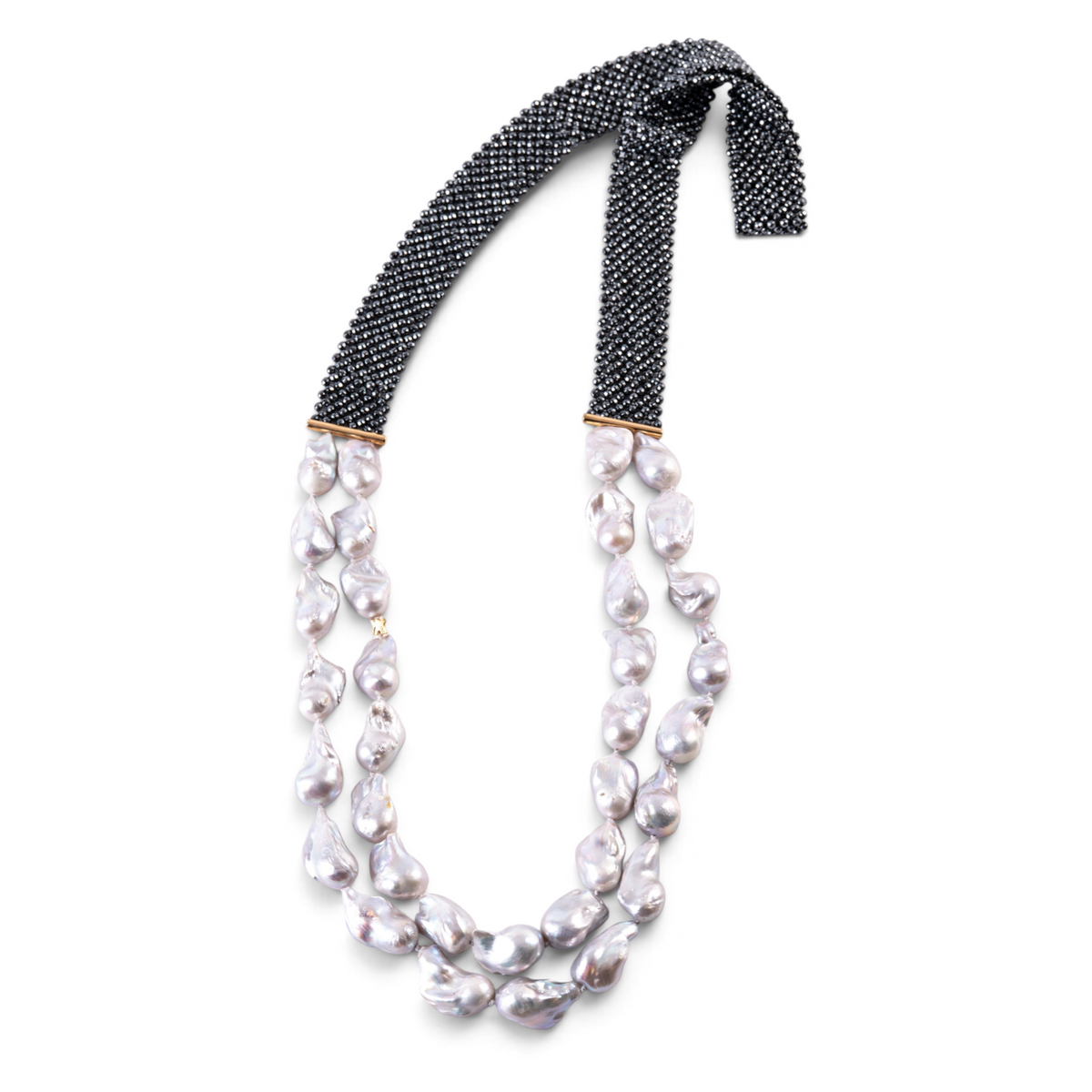 Trebor Style double strand necklace featuring grey baroque pearls and a woven band of dark faceted hematite beads.