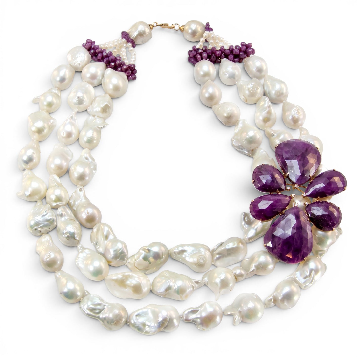 Trebor Style triple strand white baroque pearl necklace featuring a large African ruby flower pendant with diamonds.