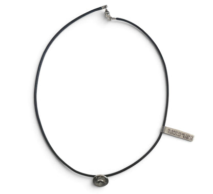 Trebor Style Bastian sterling silver open swirl pendant with diamond dust on a black cord necklace