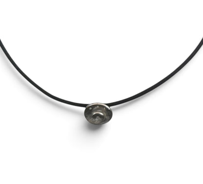 Trebor Style Bastian sterling silver open swirl pendant with diamond dust on a black cord necklace