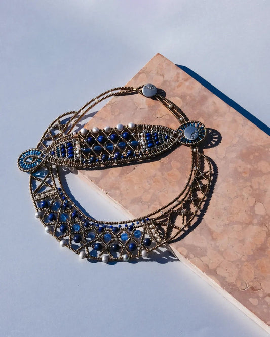 Trebor Style artisan beaded statement cuff and necklace set featuring intricate blue and gold lattice-work design.