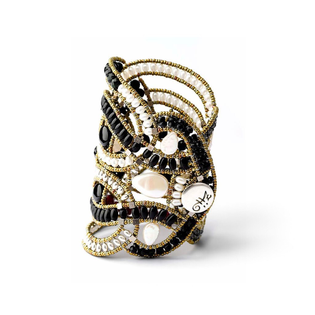 Trebor Style intricate statement bracelet featuring woven black onyx beads, white freshwater pearls, and metallic accents