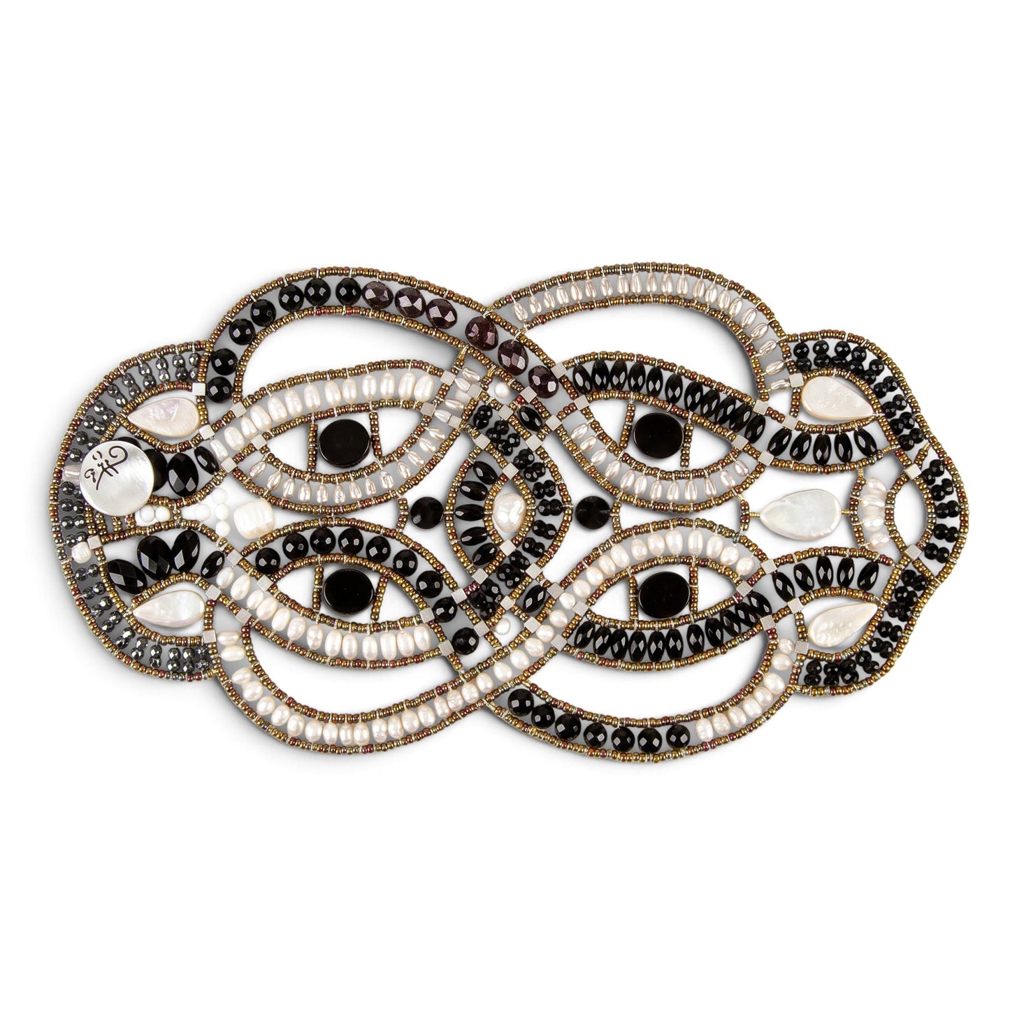 Trebor Style intricate statement bracelet featuring woven black onyx beads, white freshwater pearls, and metallic accents.