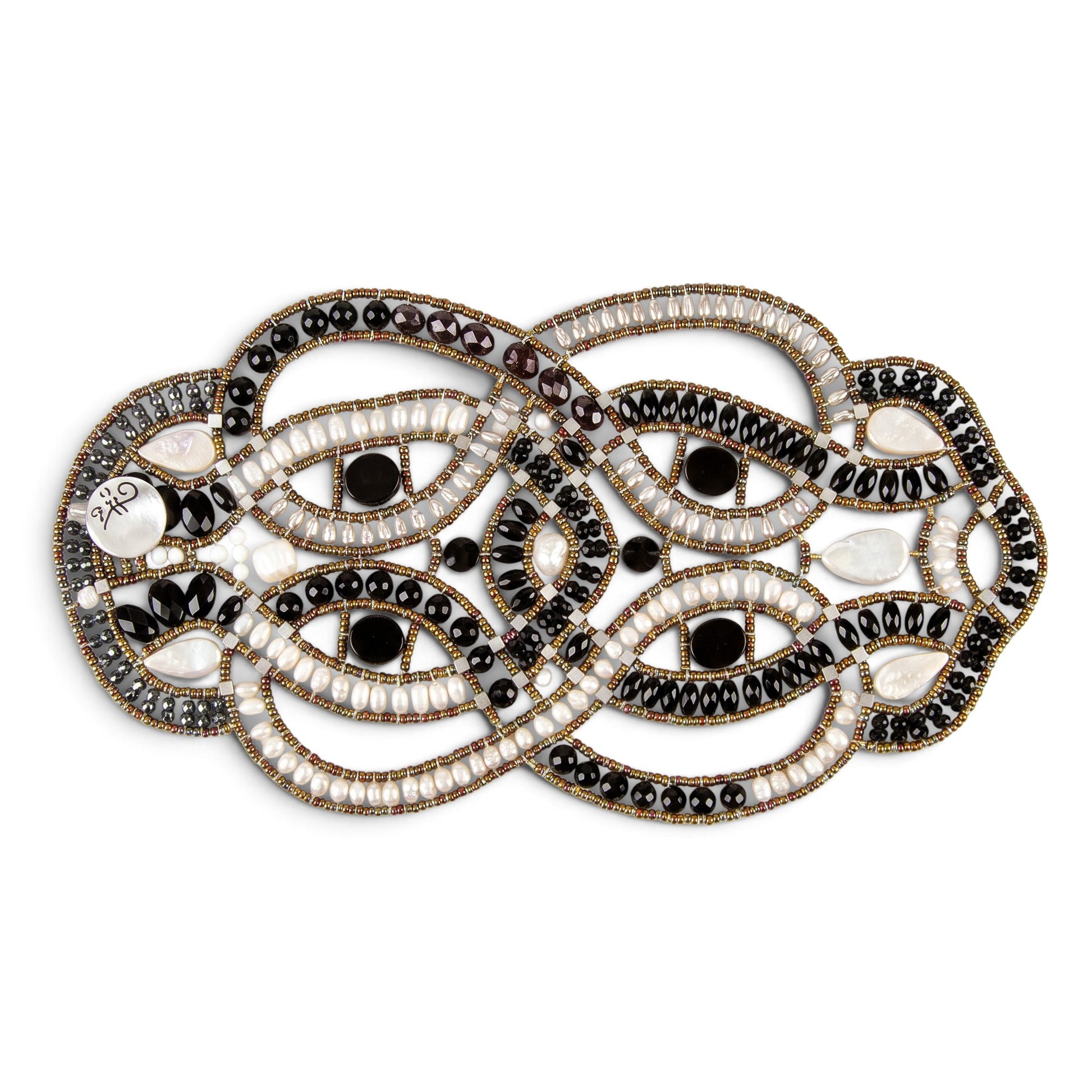 Trebor Style intricate statement bracelet featuring woven black onyx beads, white freshwater pearls, and metallic accents.