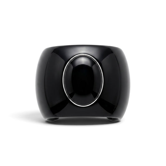 Trebor Style black acrylic cuff bracelet featuring a large oval black onyx cabochon set in a sterling silver ring.