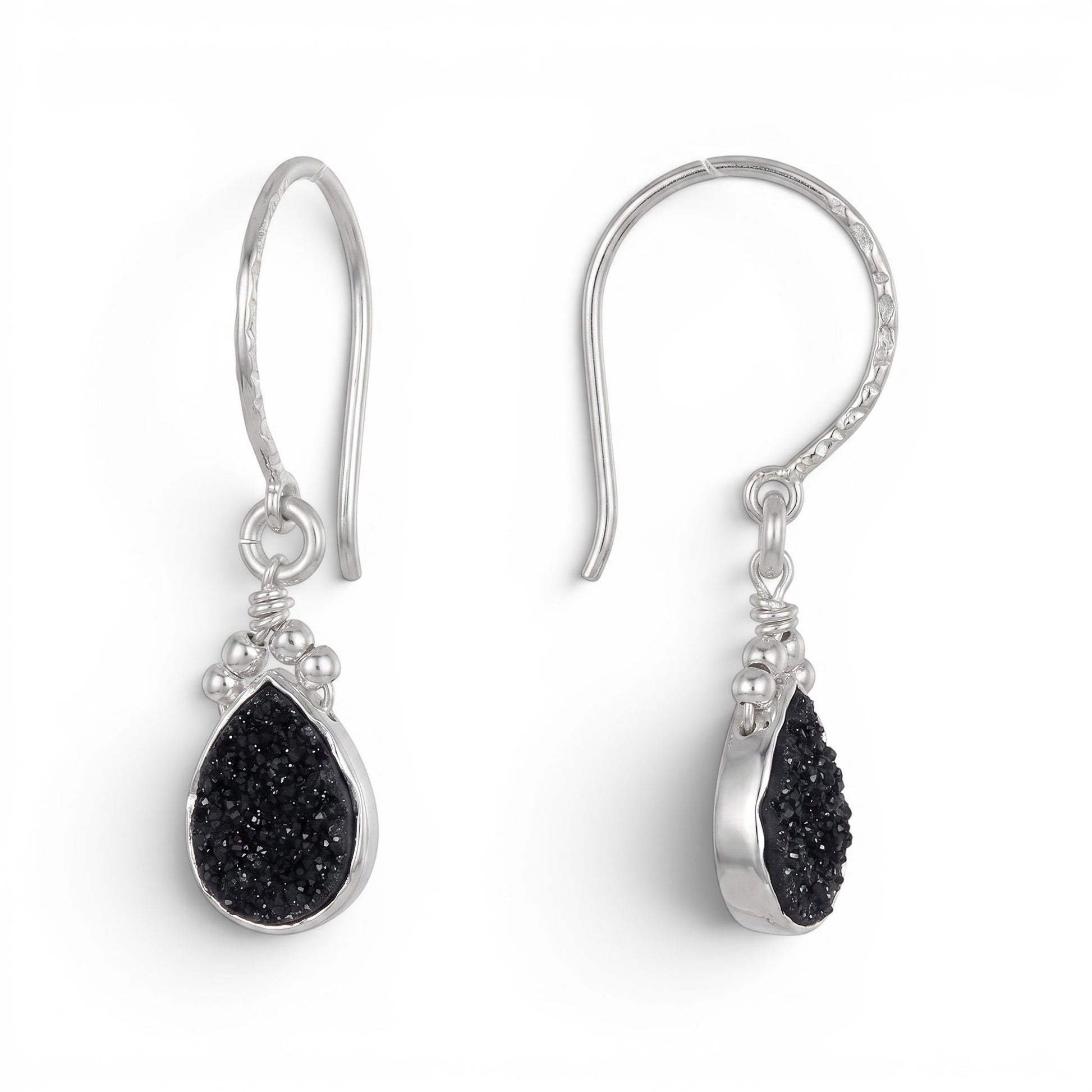 Trebor Style black druzy teardrop earrings set in sterling silver with a textured hook design.