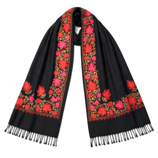 Trebor Style black wool blend shawl with intricate coral and pink floral embroidery and fringed edges.