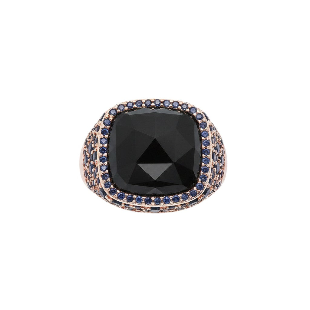 Trebor Style cocktail ring with faceted black onyx, blue cubic zirconia pavé, and 18k golden rosé plating.