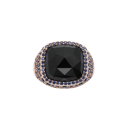 Trebor Style cocktail ring with faceted black onyx, blue cubic zirconia pavé, and 18k golden rosé plating.
