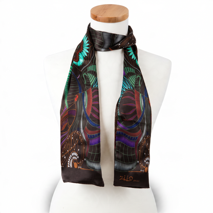 Trebor Style Ziio black silk satin tube scarf featuring a vibrant jungle print in blue, green, purple, and burgundy.