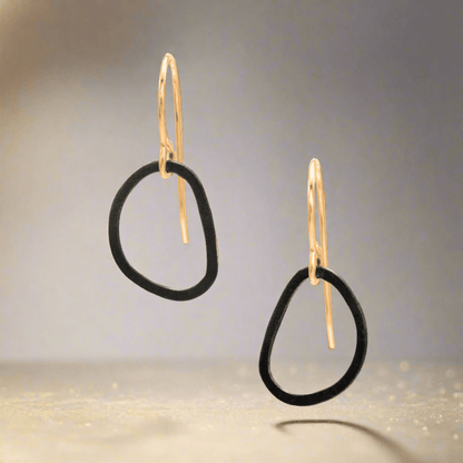 Trebor Style Noir drop earrings featuring open blackened sterling silver circles on 14kt gold-filled hooks.