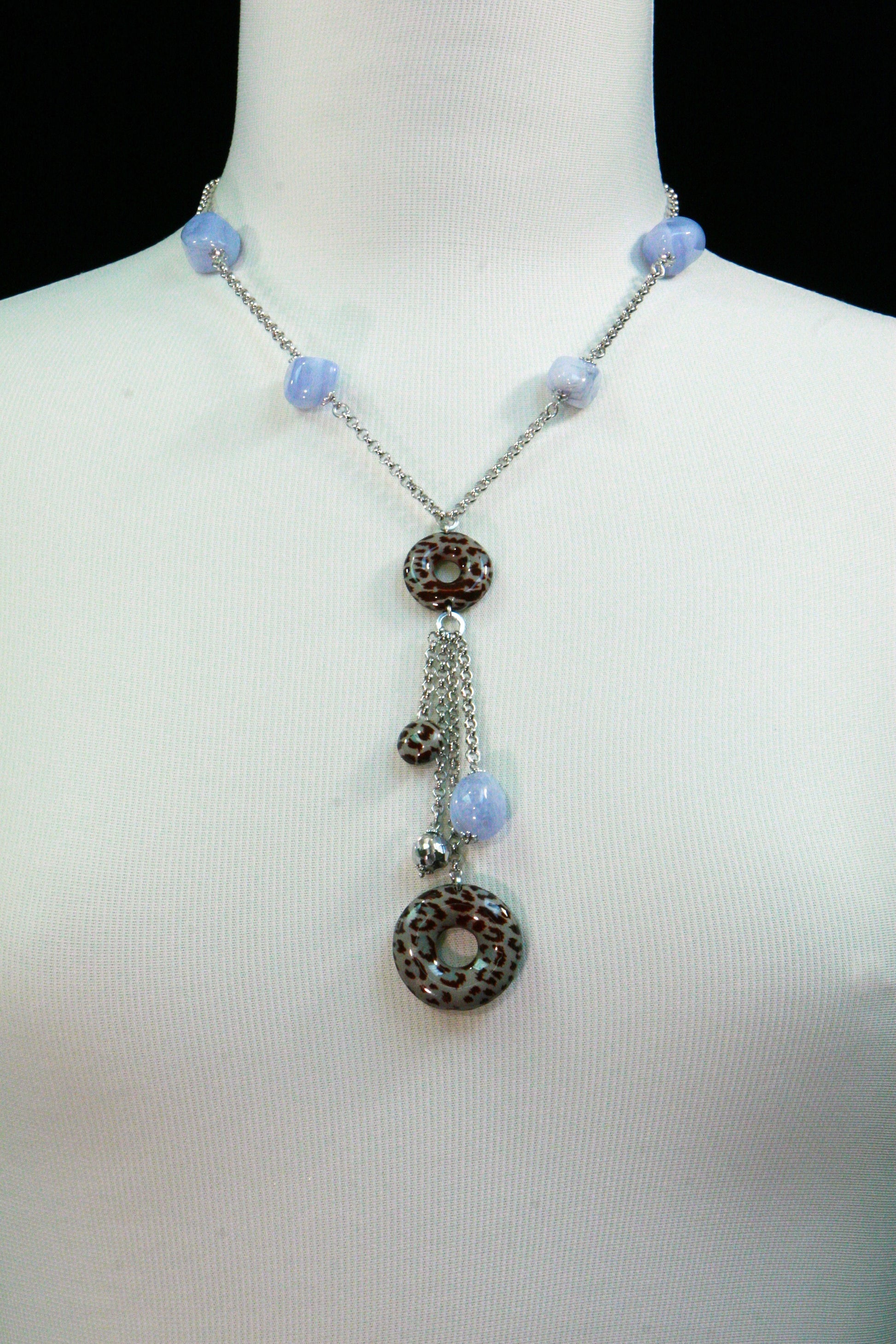 Trebor Style sterling silver Y-necklace featuring blue agate nuggets and animal print enamel beads on a tassel drop.