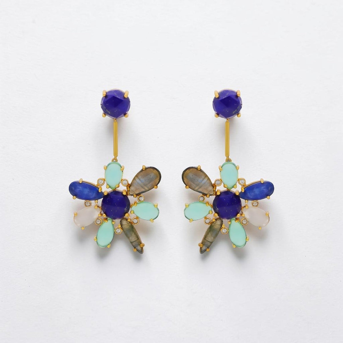 Trebor Style blue hibiscus flower earrings featuring kyanite, lapis lazuli, and aquamarine in 22k gold plated metal.