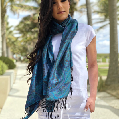 Trebor Style blue and teal modal silk Jamawar pashmina scarf with intricate paisley patterns worn by a woman
