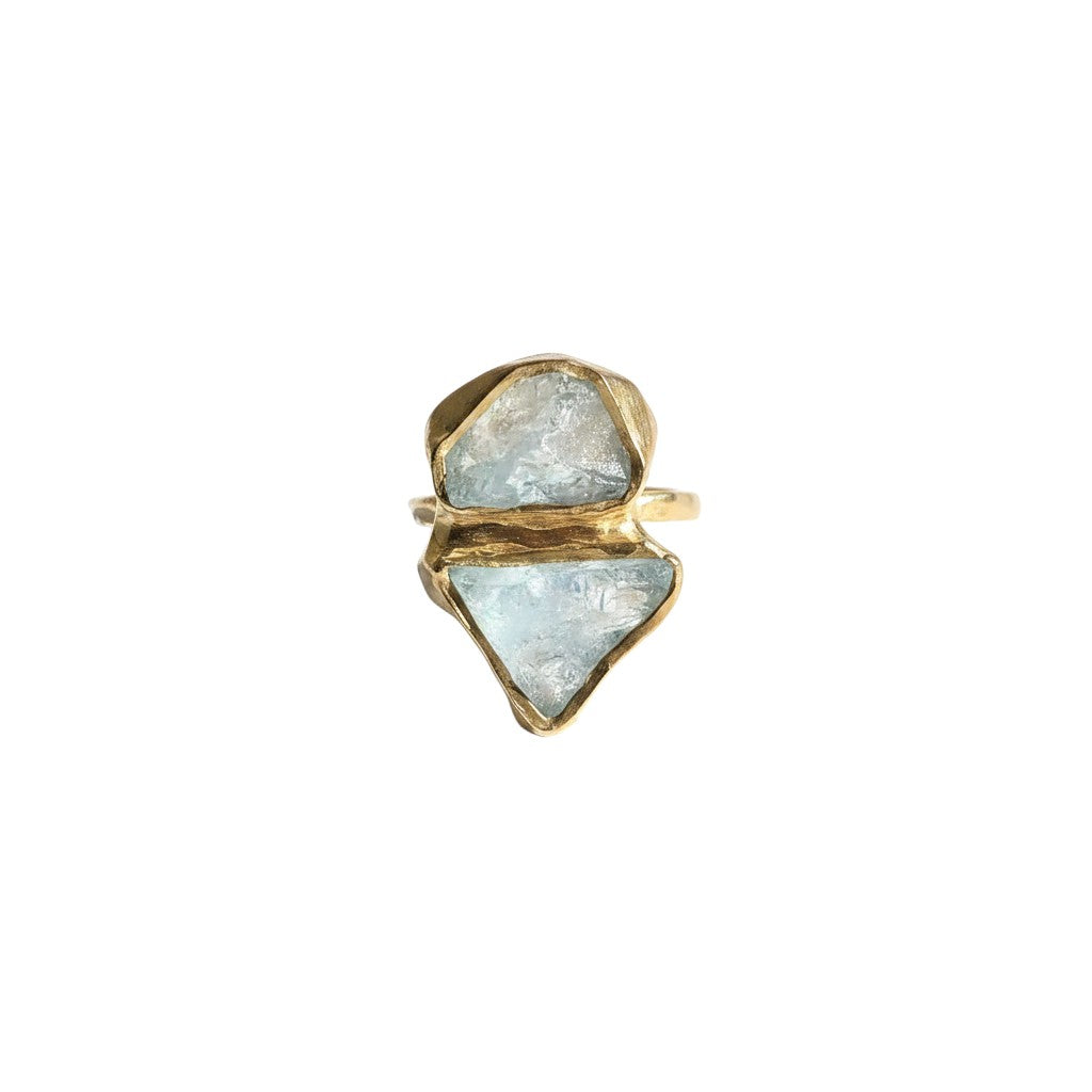 Trebor Style organic brass statement ring featuring two raw aquamarine stones in a unique, ocean-inspired design.