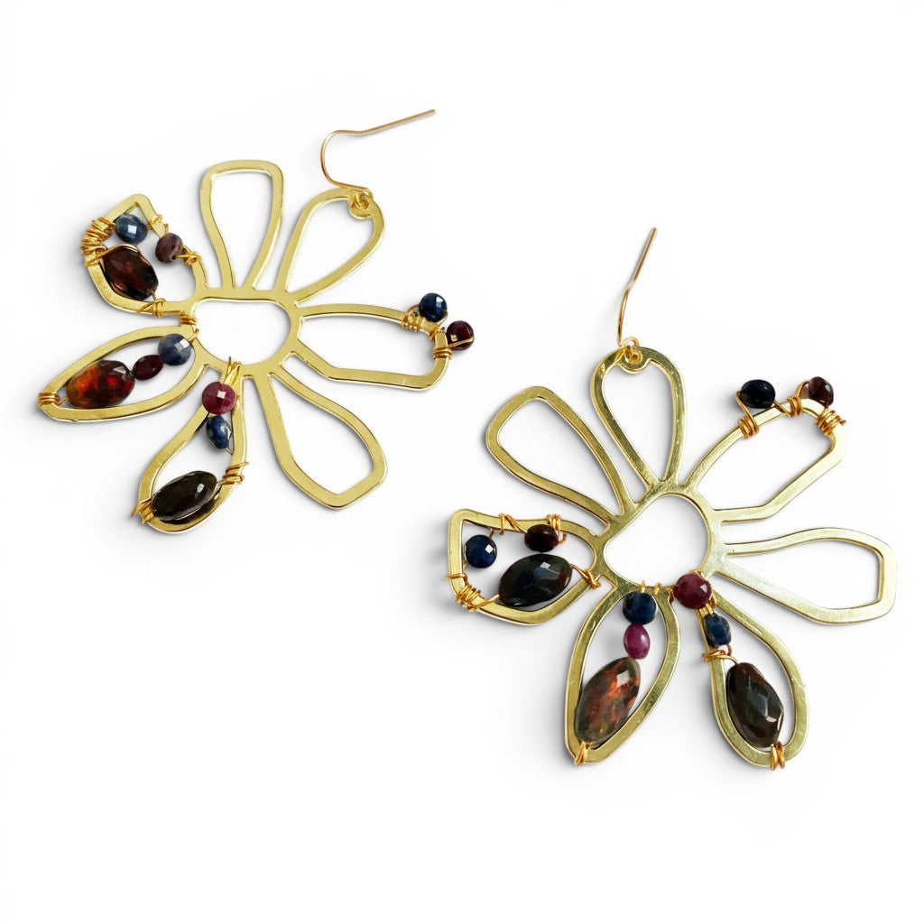 Trebor Style boho brass flower earrings featuring black opals, rubies, and sapphires, handcrafted and hypoallergenic.