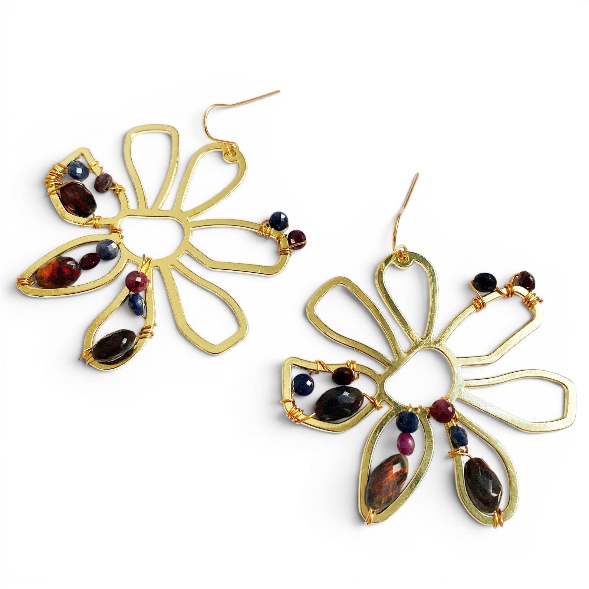 Trebor Style boho brass flower earrings featuring black opals, rubies, and sapphires on hypoallergenic hooks.