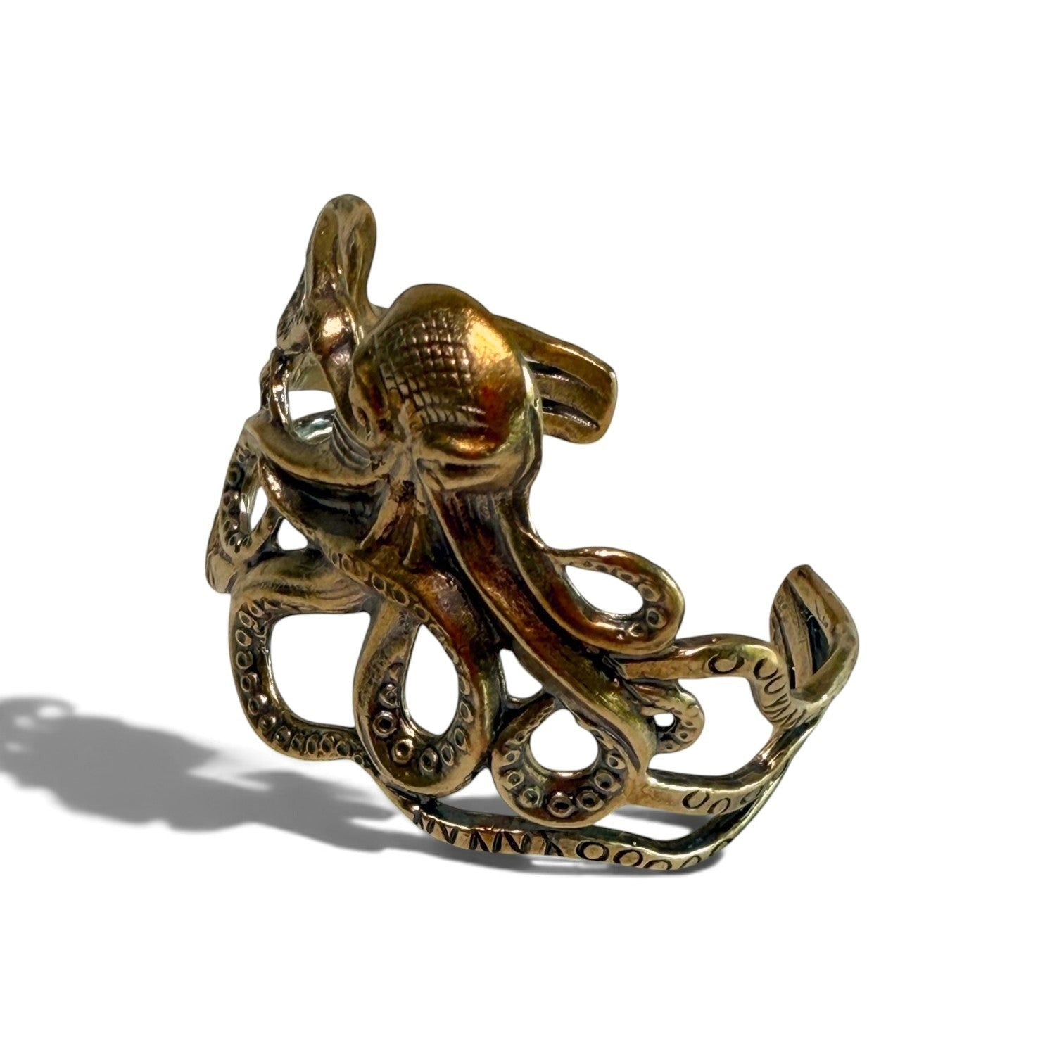 Trebor Style ornate brass octopus cuff bracelet featuring intricate tentacle details inspired by Victorian design