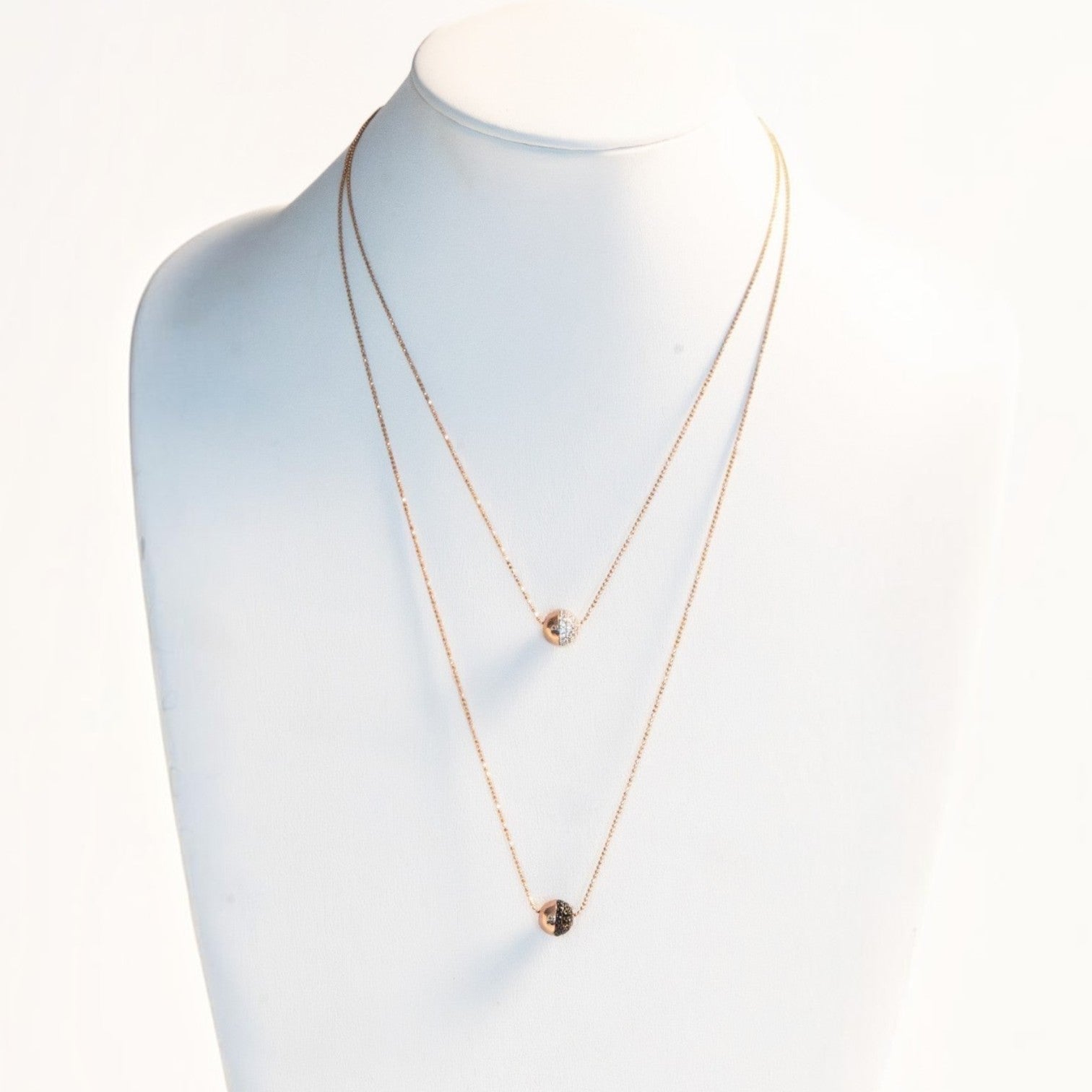 Trebor Style Bronzallure double-strand rose gold necklace with pavé white cubic zirconia and black spinel spheres.