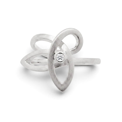 Trebor Style brushed sterling silver ring featuring a fluid weave design and a single centered diamond accent.