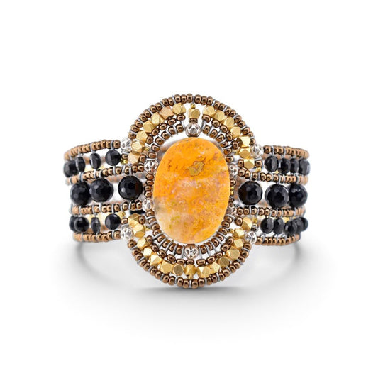 Trebor Style Arkanis oval Bumblebee Jasper cuff bracelet with black spinel, Murano glass, and freshwater pearls.