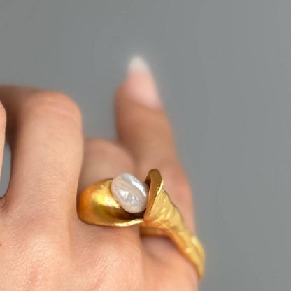 Trebor Style calla lily ring in brushed 24k gold filled finish with a lustrous white biwa pearl on a finger