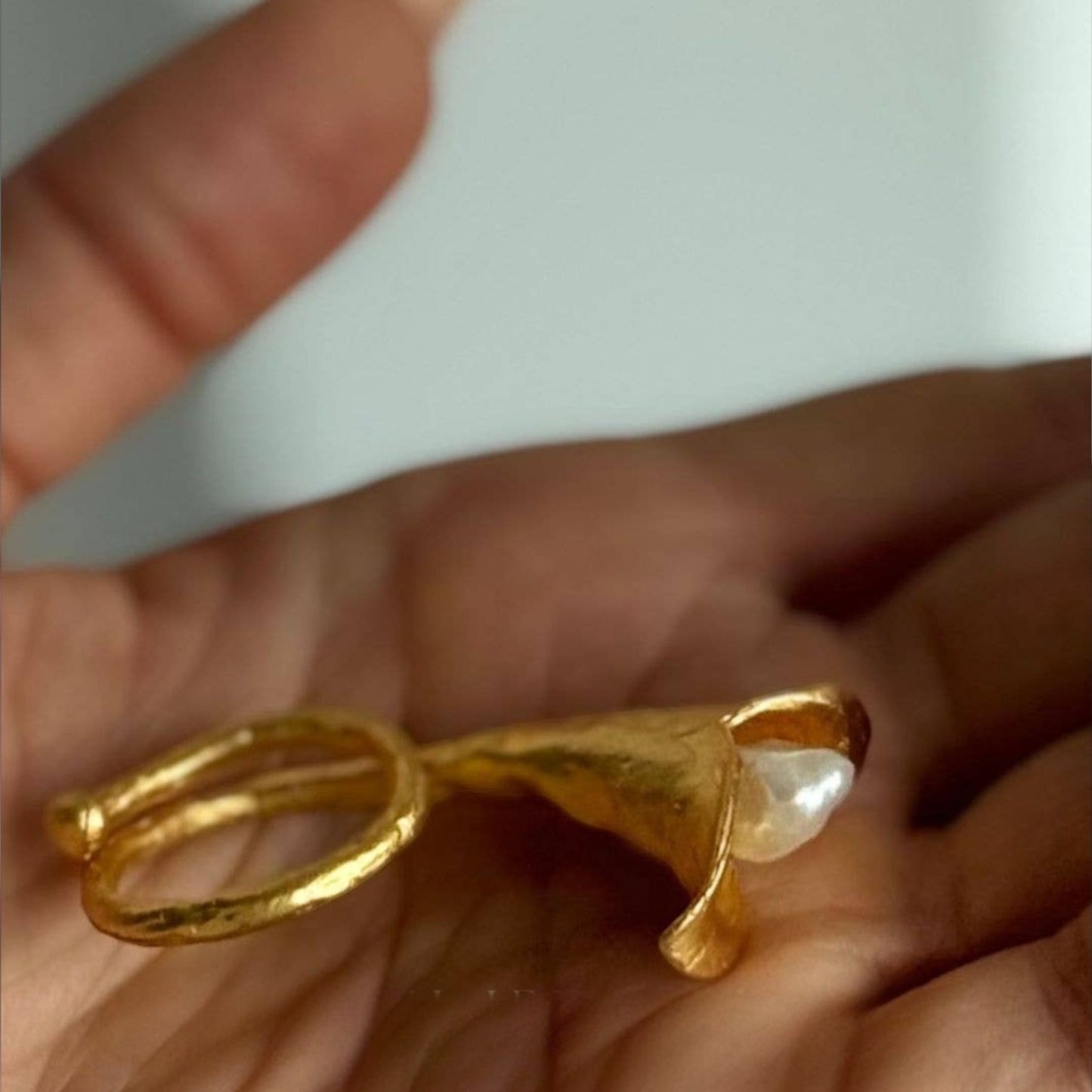 Trebor Style calla lily ring in brushed 24k gold filled metal with a lustrous white biwa pearl center