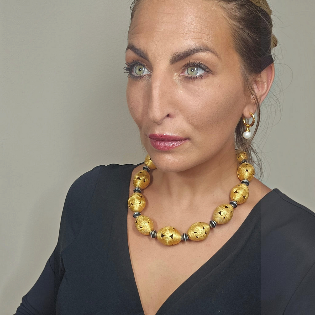 Trebor Style Masha Archer Cameroon gold wreath necklace with 24k gold plated bronze baskets and black enamel discs