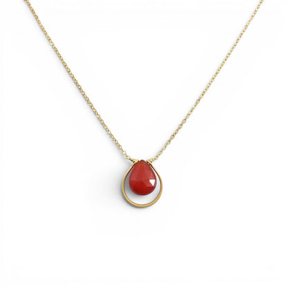 Trebor Style 14k gold fill necklace featuring a teardrop-shaped carnelian gemstone in a minimalist framework setting.