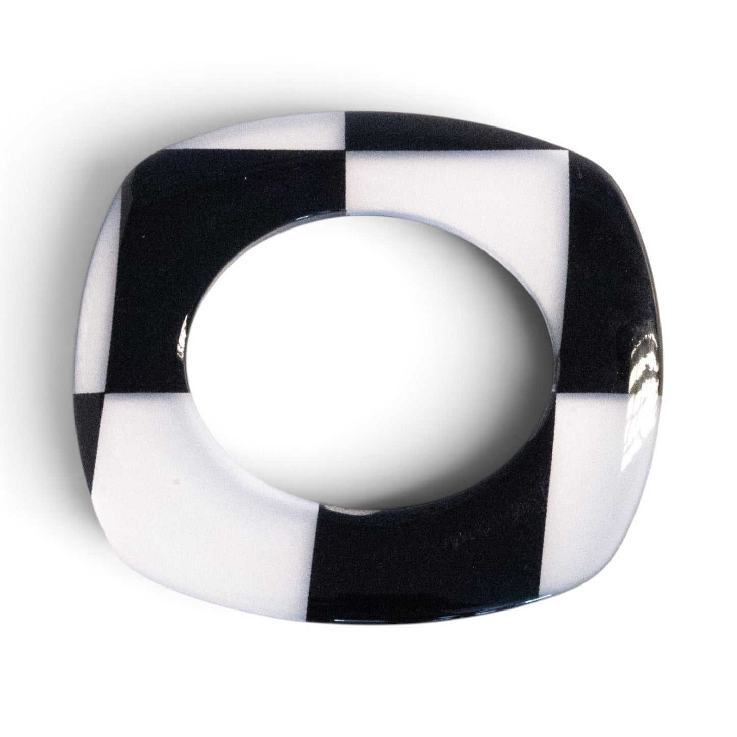 Trebor Style flat acrylic bangle featuring a hand-painted black and white checkerboard pattern in a square shape.